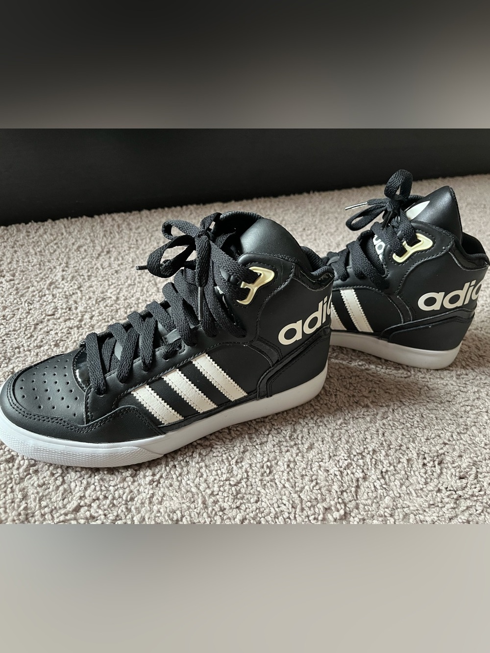 adidas Women’s Black and White High-Top Sneakers